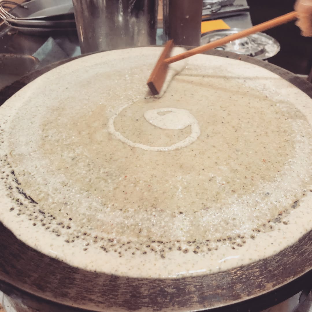 Photo of the jian bing cooking process from @oh_dumplings on instagram